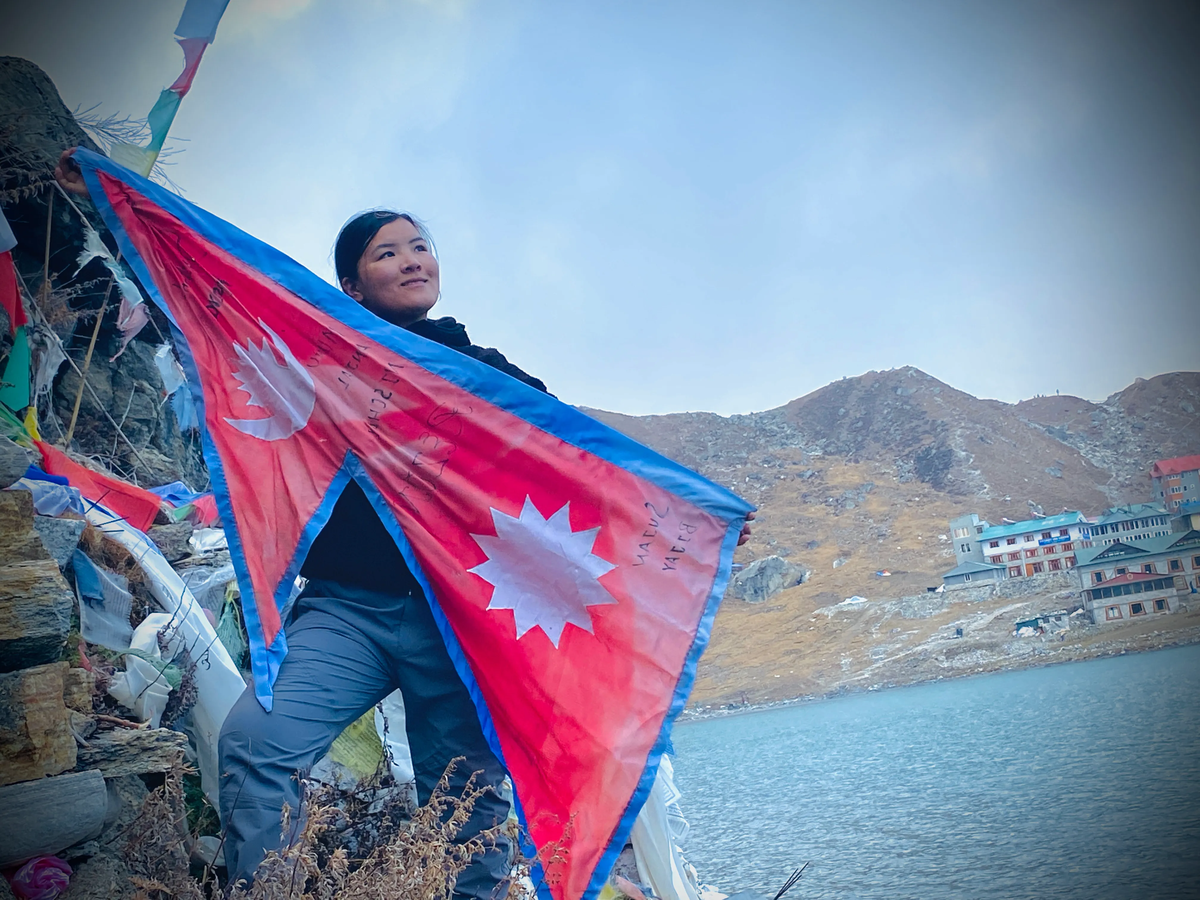 Displaying Nepal Flag at Everest Expedition